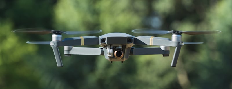 drone hovers in place outdoors