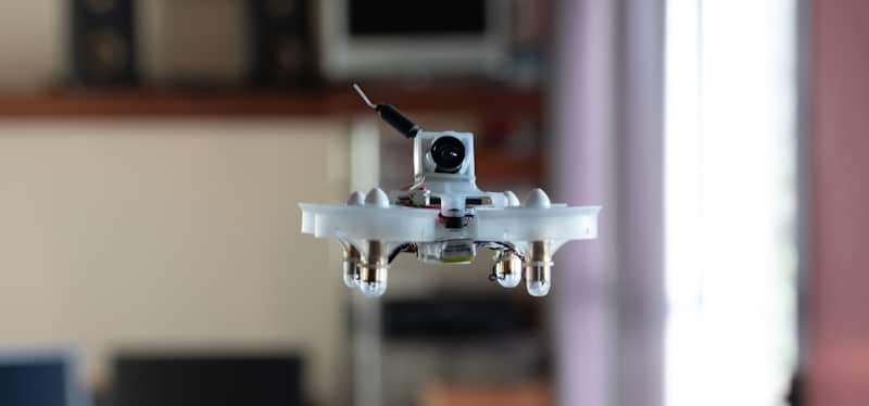 drone hovers in the middle of a living room