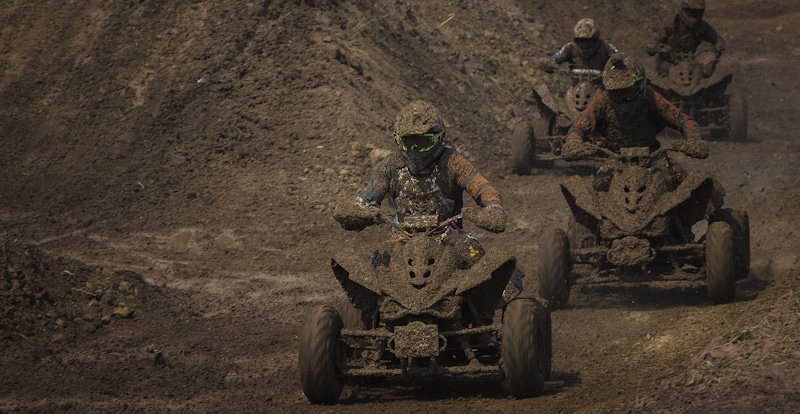 atvs racing in the mud
