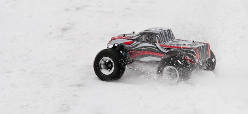 rc truck racing in the snow
