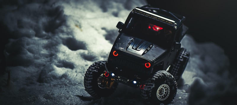 black rc suv in the snow