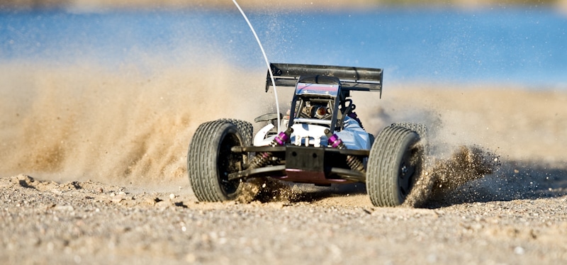 rc car drifts in sand