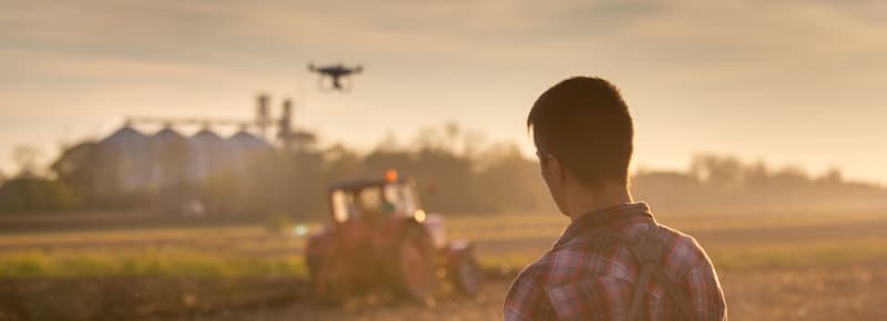 men back farm drone