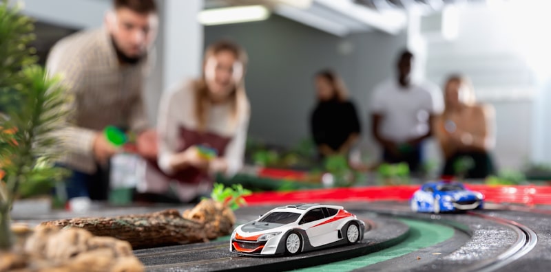 electric race cars on table track